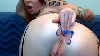 Watch A Redhead With A Butterfly Tattoo Get Tattooed On Webcam